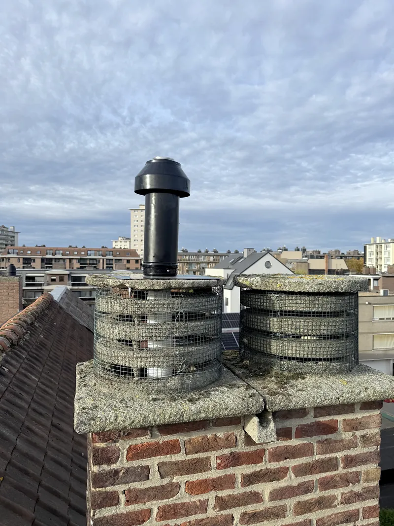 Sortie de toit, vue sur la ville